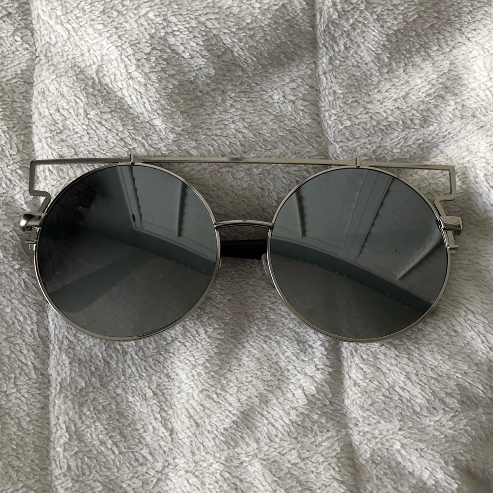 big reflective silver sunglasses